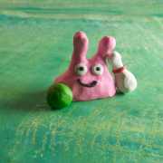 Pooky makes friends with the bowling pin